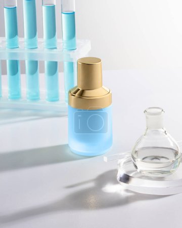 Contemporary serum bottle with golden cap thoughtfully placed in scientific setup with test tubes and glassware, reflecting focus on advanced skincare research and beauty innovation