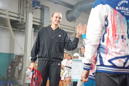 Photo for Almaty, Kazakhstan - 11.30.2022 : Elena Rybakina. Grand Slam champion Wimbledon 2022 in singles. Welcomes young fans to the Tennis Federation. - Royalty Free Image