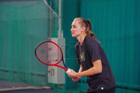 Photo for Almaty, Kazakhstan - 11.30.2022 : Elena Rybakina. Grand Slam champion Wimbledon 2022 in singles. After the press conference, she poses for the media with a racket. - Royalty Free Image