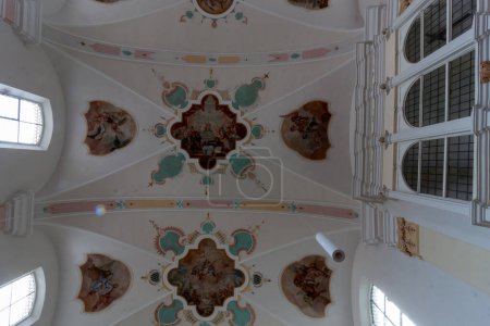 Photo for LANGENARGEN, GERMANY - AUGUST 5, 2023: Ceiling frescoes by Franz Anton Maulbert in the Catholic Church of St. Martin in Langenargen on Lake Constance - Royalty Free Image