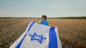 Happy Israeli Jewish little cute boy running with Israel national flag. Independence Day. Patriotism. High quality photo t-shirt #685346862
