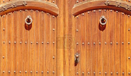 Photo for Detail of doors and ironwork for backgrounds and textures of the Monastery of Les Santes Creus in the province of Tarragona, Catalonia, Spain, Europe - Royalty Free Image