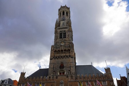 Photo for Bruges, Belgium - September 8, 2022: Impressive medieval building it is massive the Belfort van Brugge in front of which is a large square, not visible here. - Royalty Free Image