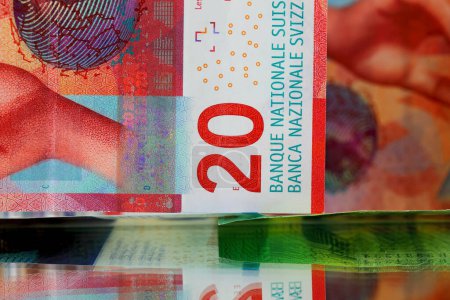 Photo for Swiss franc banknotes side by side. Paper money, CHF. These Swiss banknotes were issued from April 2016 to 2019 and are currently in circulation - Royalty Free Image