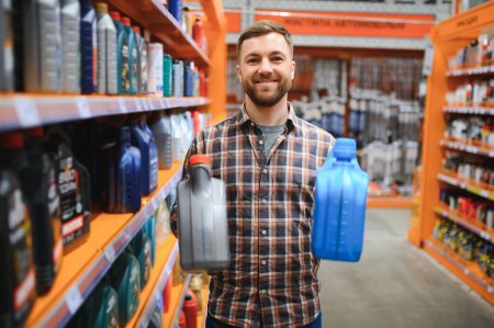 man buys automobile chemicals in the auto parts store.