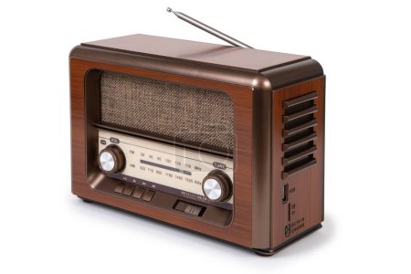 Foto de Portable retro radio isolated on white background, devices which are popular in the past for music and news - Imagen libre de derechos