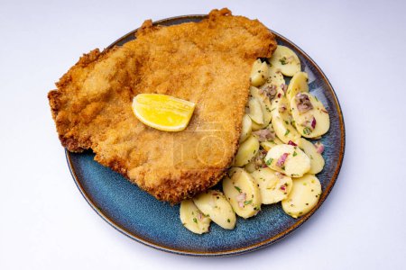 Photo for Wiener schnitzel on clarified butter - Royalty Free Image