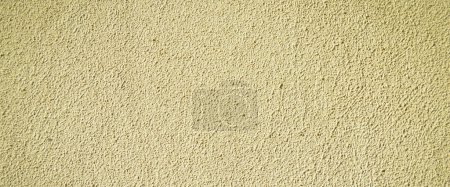 Foto de Textura de pared de color beige y blanco con superficie rugosa, yeso de pared rugosa - Imagen libre de derechos