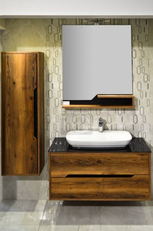 Fregadero de baño moderno y limpio y diseño de gabinete marrón