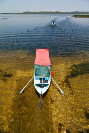 Photo for Touristic sightseeing wooden boats around Ulubat or Uluabat Lake in Bursa, Turkey, June 25 2023 - Royalty Free Image