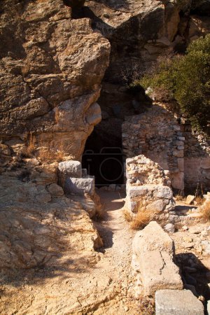 Photo for Remains of a standard house and cave entrance in the ancient city of Knidos, one of the oldest ancient cities in Anatolia, Turkey Mugla Datca, June 26 2023 - Royalty Free Image