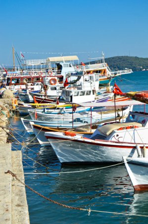Photo for Wooden fishing boats on the beach at Cunda island in Balikesir Ayvalik, Turkey, september 11 2020 - Royalty Free Image