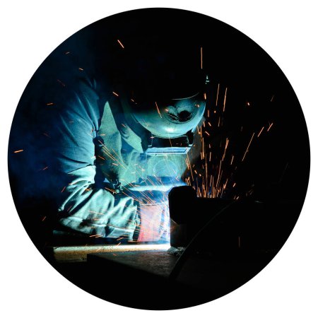 Photo for Welder uses torch to make sparks during manufacture of metal equipment, professional welding master - Royalty Free Image