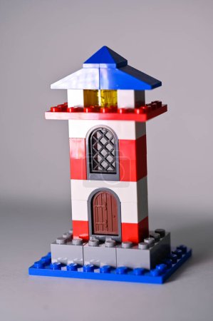 Photo for Little house built of lego blocks on white table Sweden january 2023 - Royalty Free Image