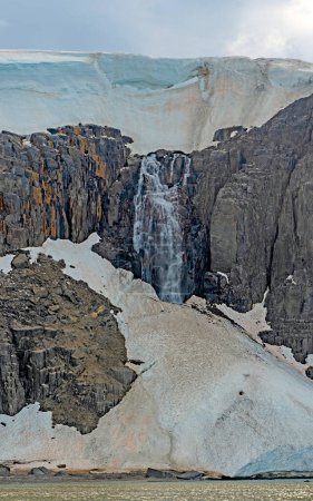 Massive Waterfall From a Melting Coastal Glacier at 