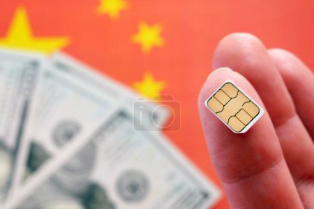 Photo for China flag, cash money dollar and sim card, concept, closeup - Royalty Free Image