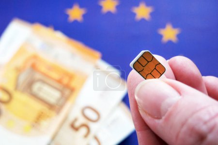 Photo for European Union flag, cash money euro and  sim card. concept - Royalty Free Image