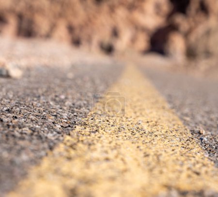 Photo for Low-angle image of a Paved road in Death Valley California. High quality photo of the artists Drive in Death Valley National Park. - Royalty Free Image