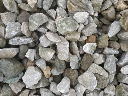 Foto de la textura de la piedra triturada gris