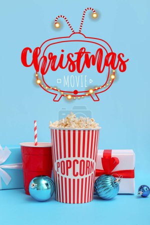Banner with popcorn, soda drink, Christmas balls and gifts on blue background. Christmas celebration