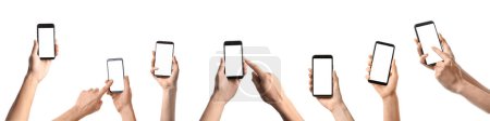 Group of hands holding mobile phones with blank screens on white background