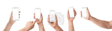 Foto de Collage de manos sosteniendo teléfonos móviles modernos con pantallas en blanco sobre fondo blanco - Imagen libre de derechos