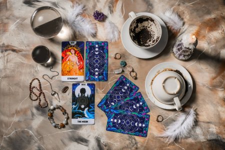 Photo for Magic attributes of soothsayer and tarot cards on table - Royalty Free Image