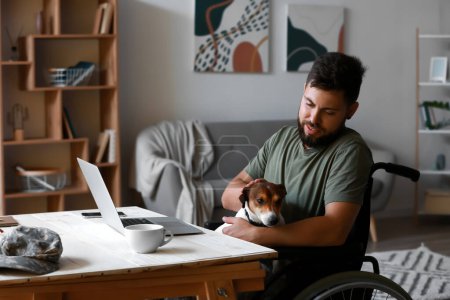 Soldier in wheelchair with dog at home