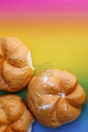 Photo for Delicious kaiser rolls on color background - Royalty Free Image
