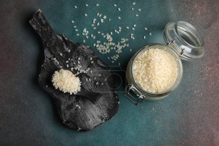 Photo for Jar with rice on dark background - Royalty Free Image