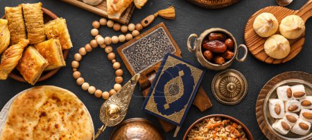 Photo for Traditional Eastern dishes with Quran, Arabic lamp and tasbih on dark background - Royalty Free Image