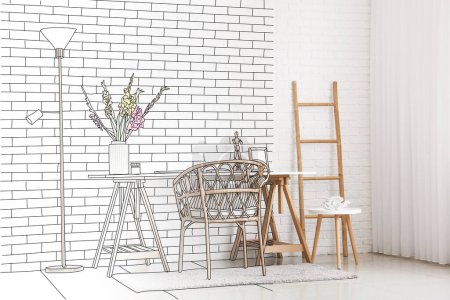 Téléchargez les photos : New interior of room with cozy workplace and wicker armchair near light brick wall - en image libre de droit