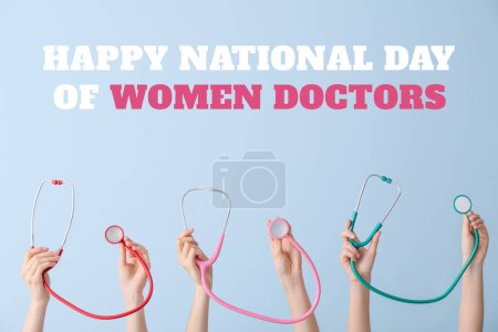 Greeting card for National Day of Women Doctors with many hands holding stethoscopes on light blue background
