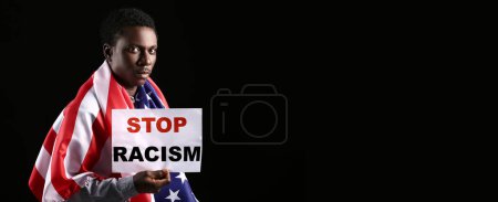 Téléchargez les photos : African-American man with poster and national flag of USA on dark background with space for text. Stop racism - en image libre de droit