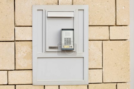 Photo for Modern intercom on stone building outdoors - Royalty Free Image