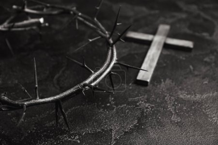 Photo for Crown of thorns and cross on dark background, closeup - Royalty Free Image