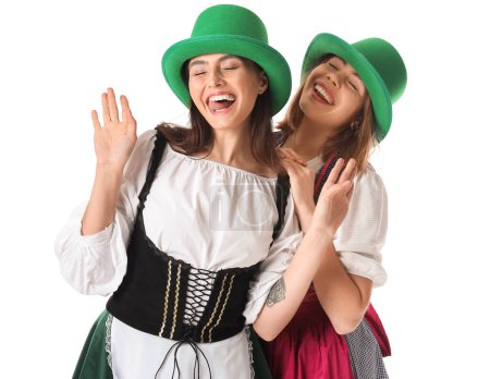 Téléchargez les photos : Irish waitresses in hats on white background. St. Patrick's Day celebration - en image libre de droit