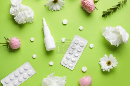 Photo for Nasal drops with pills, flowers and tissues on green background. Seasonal allergy concept - Royalty Free Image