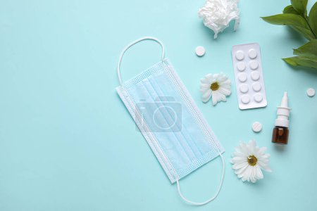 Photo for Nasal drops with pills, flowers, medical mask and tissue on color background. Seasonal allergy concept - Royalty Free Image