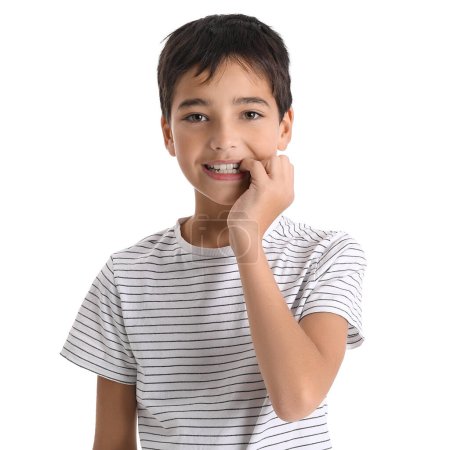 Photo for Little boy biting nails on white background - Royalty Free Image