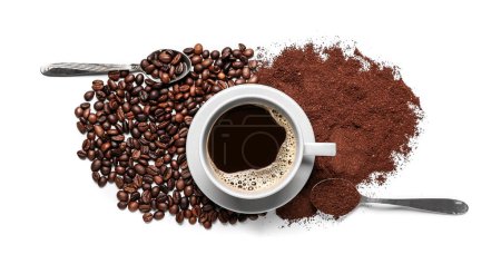 Cup of coffee with powder, beans and spoons on white background