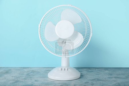 Photo for Electric fan on blue background - Royalty Free Image