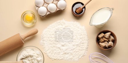 Different ingredients for baking on light background