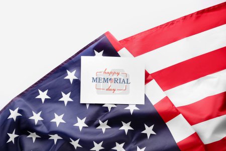 Greeting card with text HAPPY MEMORIAL DAY and USA flag on white background