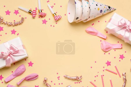 Photo for Frame made of different party decor on yellow background - Royalty Free Image