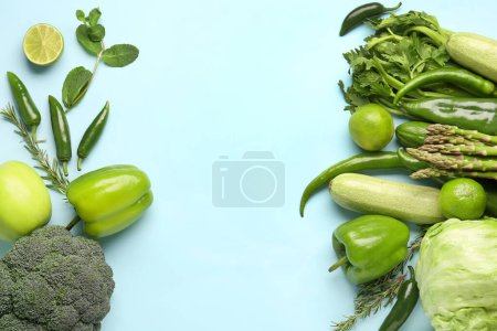 Composition with different fresh vegetables and fruits on blue background puzzle 649259540