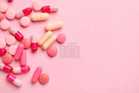 Photo for Different pills on pink background - Royalty Free Image