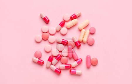 Photo for Different pills on pink background - Royalty Free Image