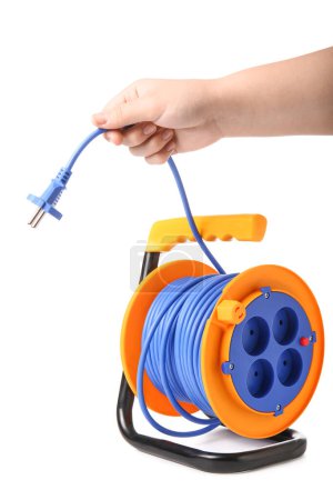 Foto de Carrete de cable eléctrico de mano hembra con extensión sobre fondo blanco - Imagen libre de derechos