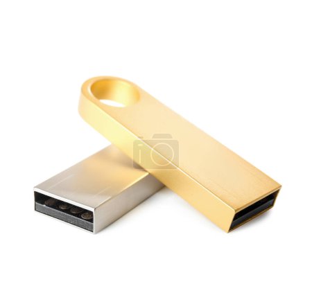 Foto de Unidades flash USB metálicas aisladas sobre fondo blanco - Imagen libre de derechos